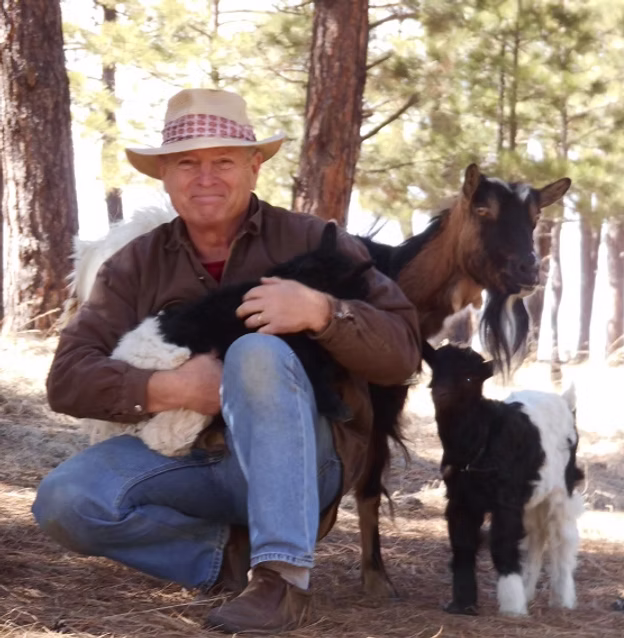 Ric Morgan holding a goat